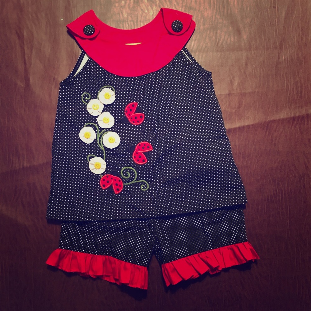 2 piece ladybug outfit marked as 2T fits many size